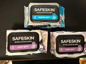 445016639616 OWENS MINOR INC Safeskin Nitrile Gloves Pop Go